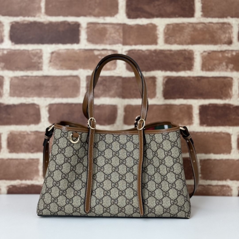 G*u*i shopping bags